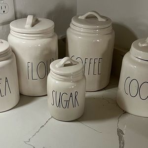 Rae Dunn Canister set, honey pot and watering jug. Can sell individually.